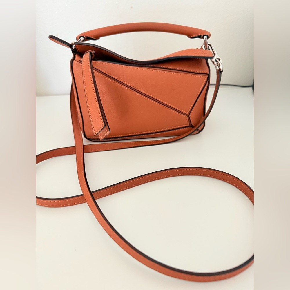 Mini Loewe Puzzle Top-Handle leather bag in Tan color